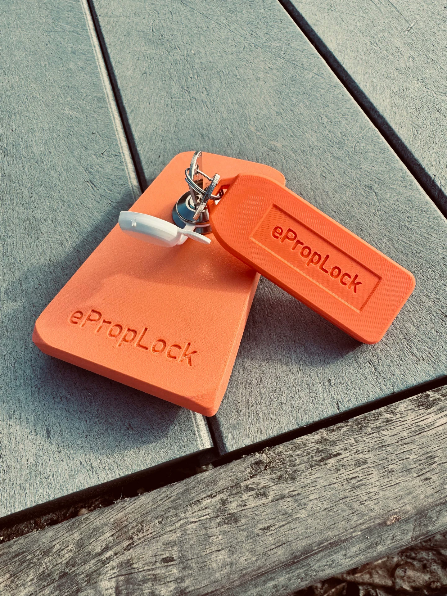 ePropLock battery and transom locks with keys